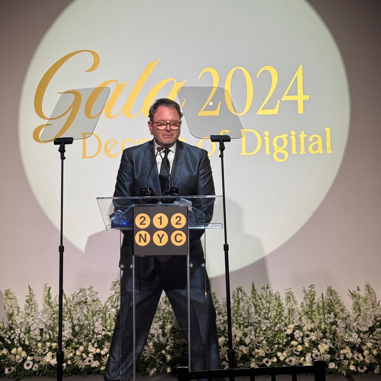 Steve at a gala podium